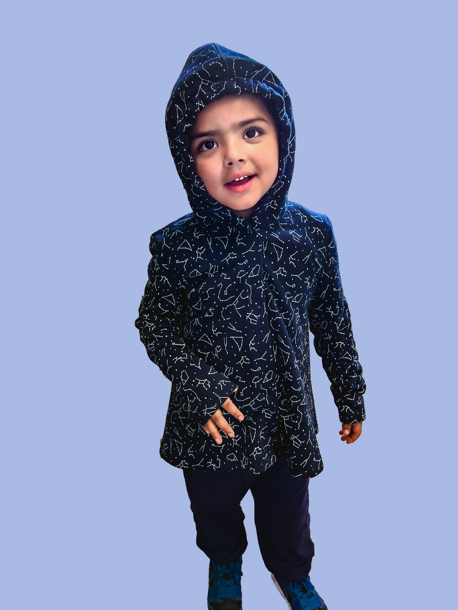 Autistic boy in sensory hoodie with sound reduction