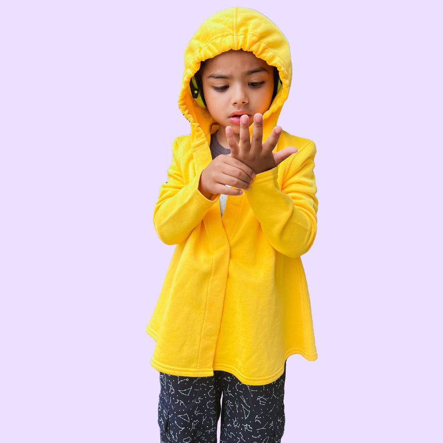 Sensory friendly hoodie with hood that fits headphones, magnetic closures, and no tags