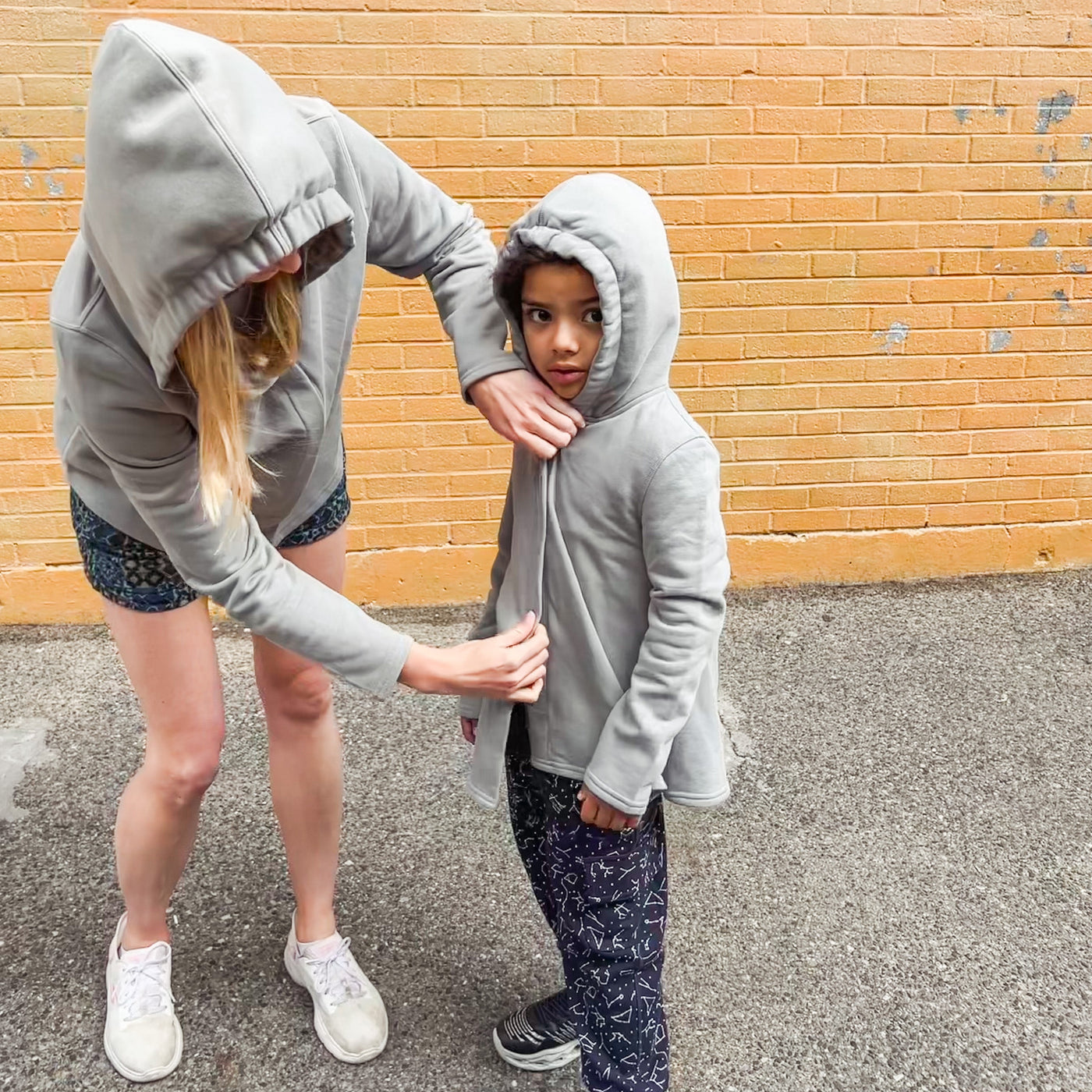 Sound reducing sensory hoodies on kid and adults
