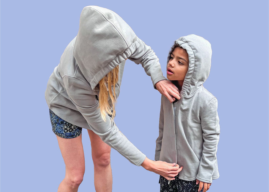 Adult sensory hoodie and autistic child in sensory clothing.