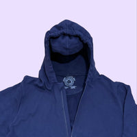 Blue sound reducing sensory hooded sweatshirt with eye mask for sensory break with a brand logo on a light purple background