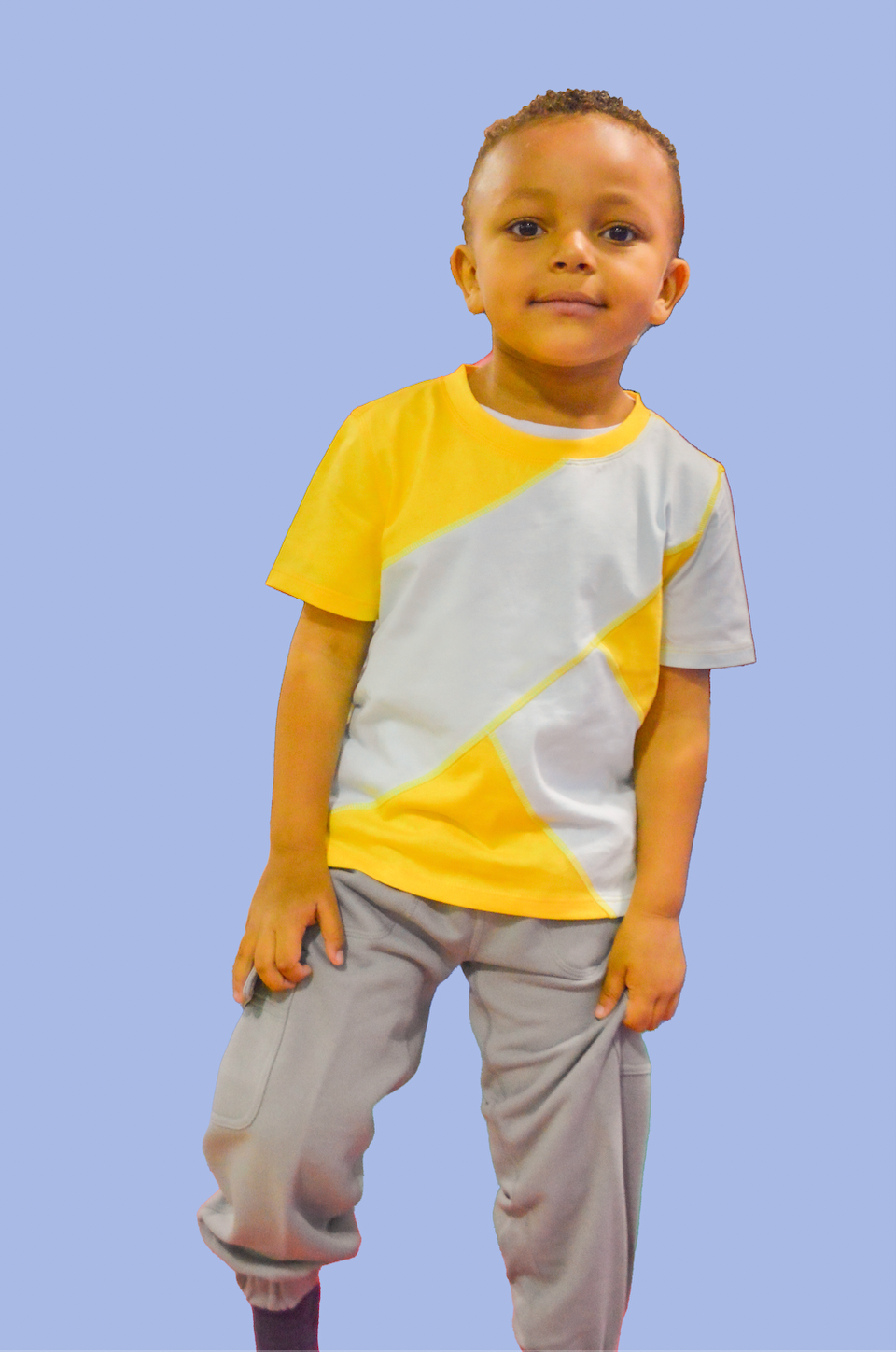 Sensory friendly outfit of a soft tagless cotton shirt and sensory friendly pants with a built-in fidget.