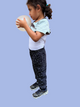 Adjustable compression shirt built in under a sensory friendly cotton t-shirt.