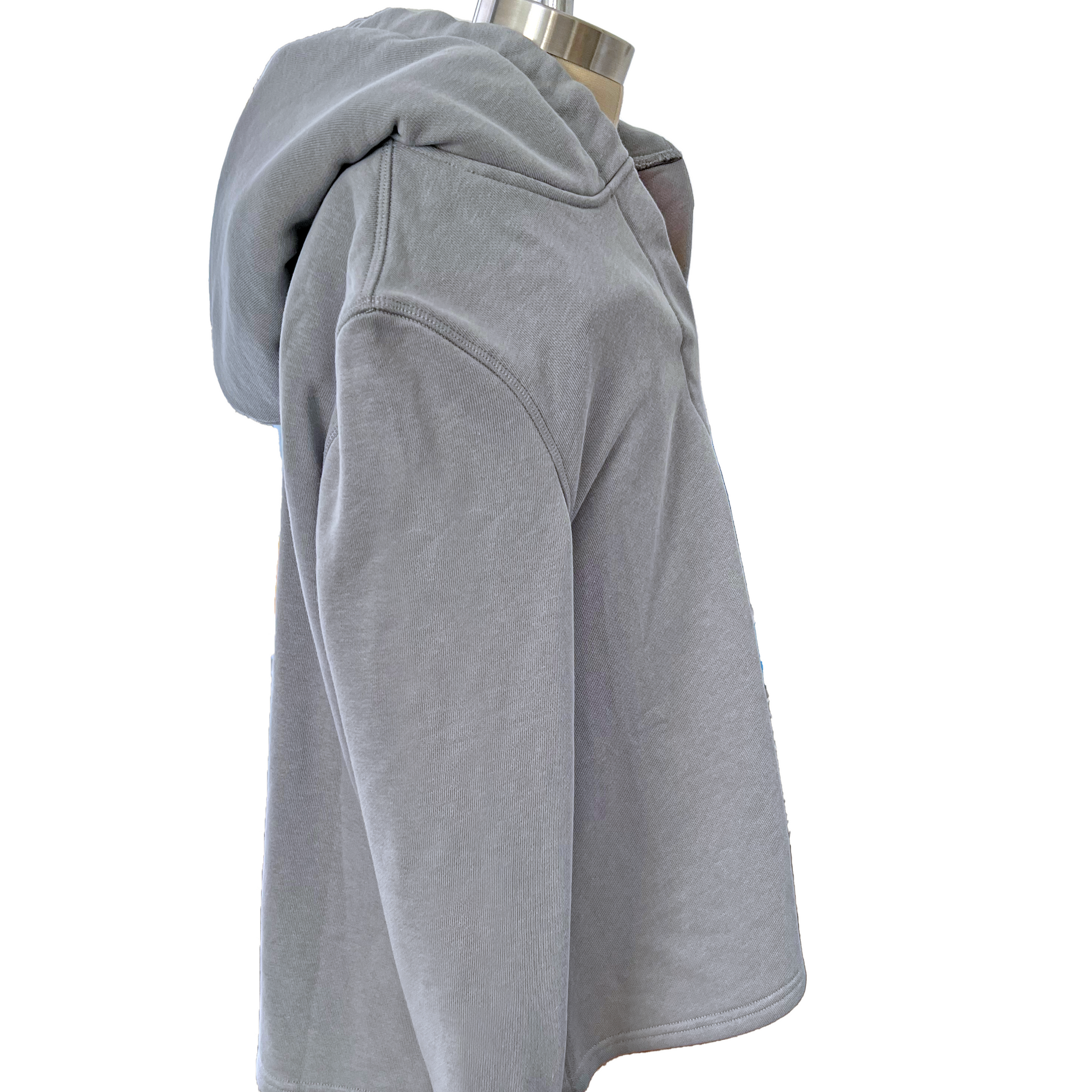 Grey stimuli reducing hoodie with magnetic closures and sound reducing hood.